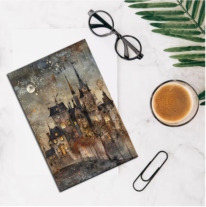 Artistic depiction of a castle with a cup of coffee, glasses, and a paperclip on a marble surface.