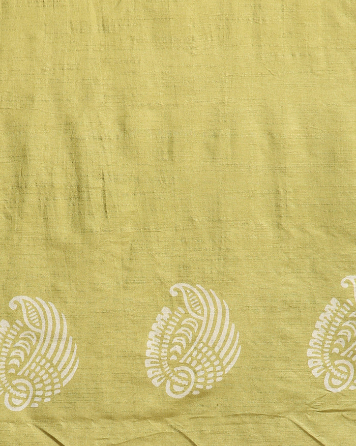 Charcoal grey and olive green Katan silk unstitched suit set with all-over floral paisley block print in muted earth tones, peach and pale yellow accents and a tasselled dupatta