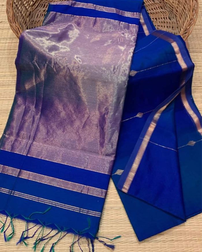 Cobalt blue Maheshwari silk saree with small dobby-set buti and a lavender pallu banded in copper, handwoven in Maheshwar
