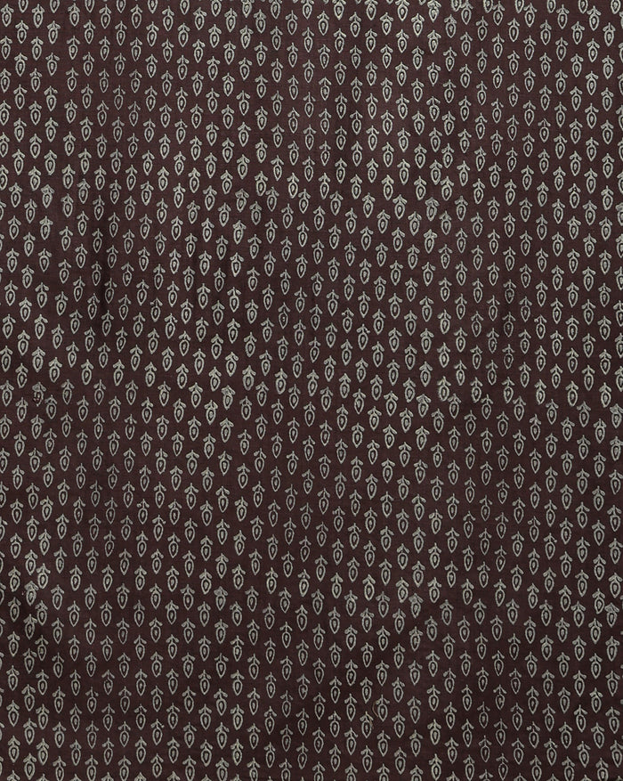 Dark brown Katan silk unstitched suit set with all-over off-white paisley on the top, a plain brown bottom piece and a dupatta with a wide patterned end panel