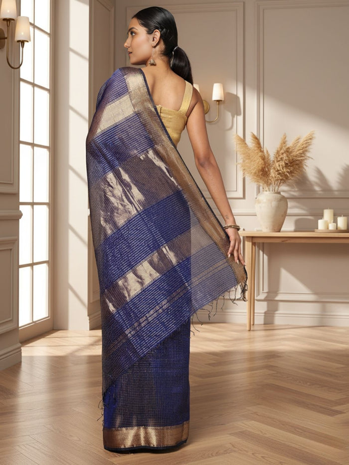 Deep indigo handloom Maheshwari silk saree with fine checks and a gold striped zari pallu