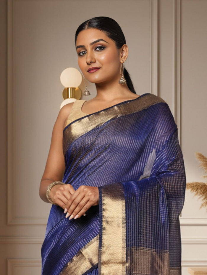 Deep indigo handloom Maheshwari silk saree with fine checks and a gold striped zari pallu