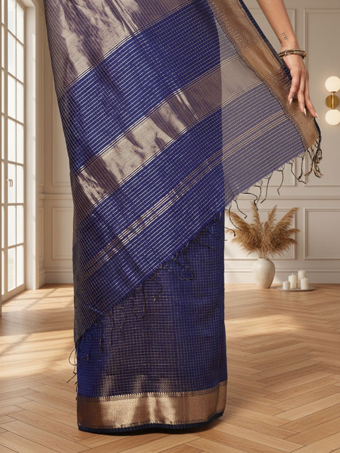 Deep indigo handloom Maheshwari silk saree with fine checks and a gold striped zari pallu