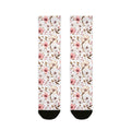 Floral patterned socks on a white background