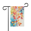 Decorative garden flag with colorful leaf design on a white background