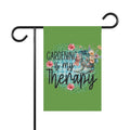 Garden flag with 'Gardening is my Therapy' text and floral design on a green background.