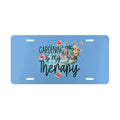 License plate with 'Gardening is my Therapy' text and floral design on a blue background