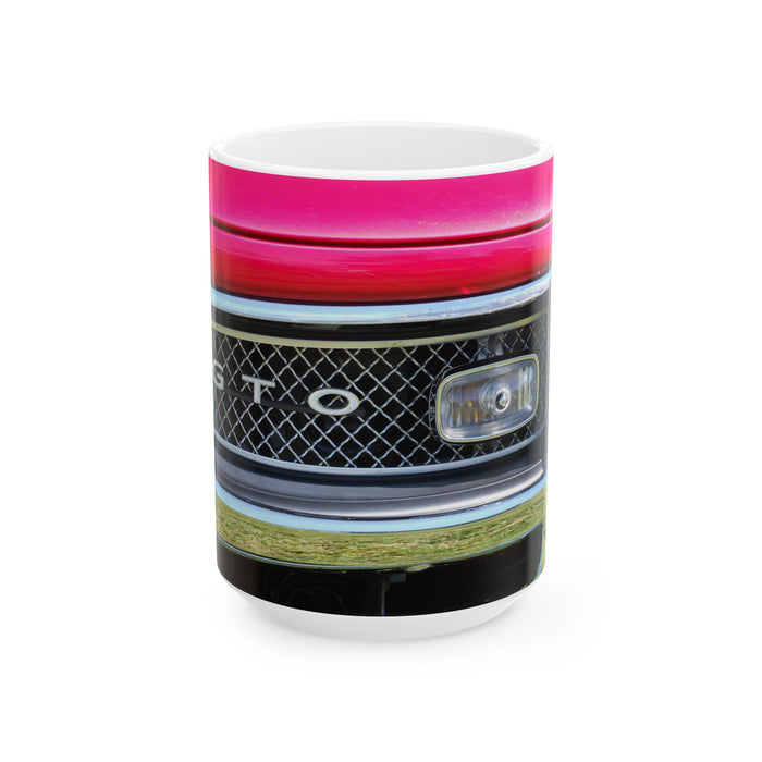 Colorful mug with a patterned design on a white background