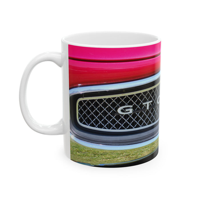 Mug with colorful design featuring a car grille on a white background