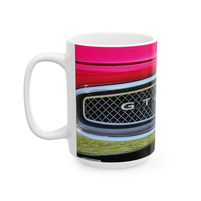 Mug with car grille design featuring the letter 'G' on a white background