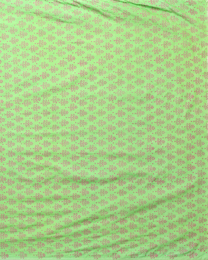 Lime green katan silk unstitched suit set hand block printed with terracotta botanical motifs, shown with a bordered dupatta finished in a short fringe.