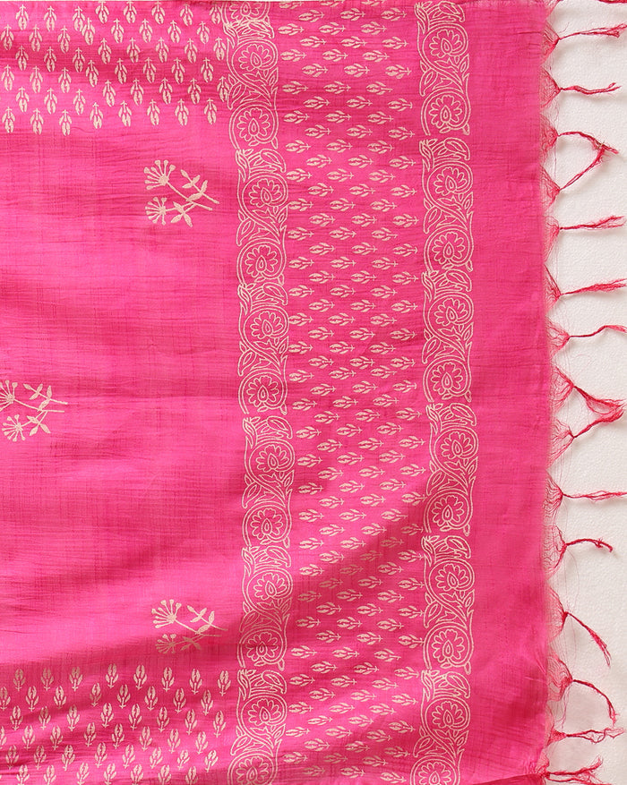 Magenta katan silk unstitched suit set hand block printed with small off-white sprigs, shown with a tasselled dupatta bordered in floral garlands and a plain bottom.
