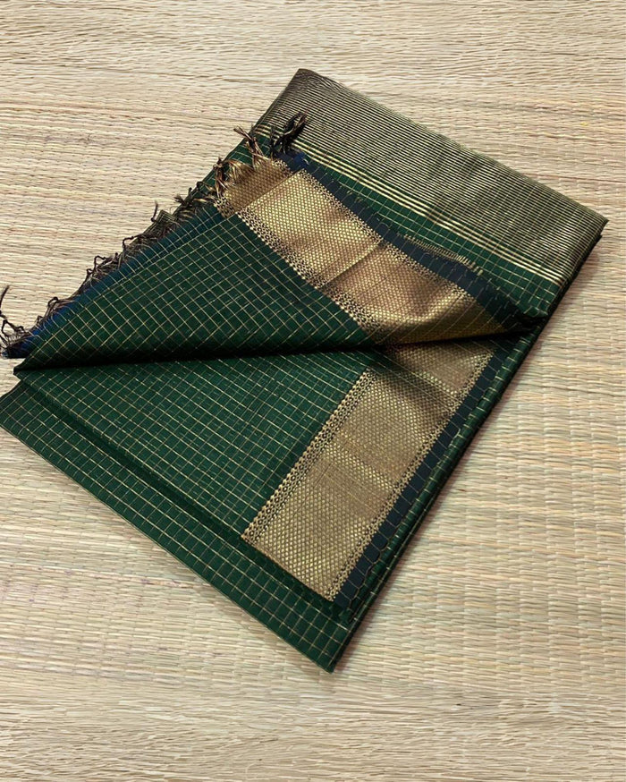 Misty dark green handloom Maheshwari silk saree with fine checks and a broad golden zari border
