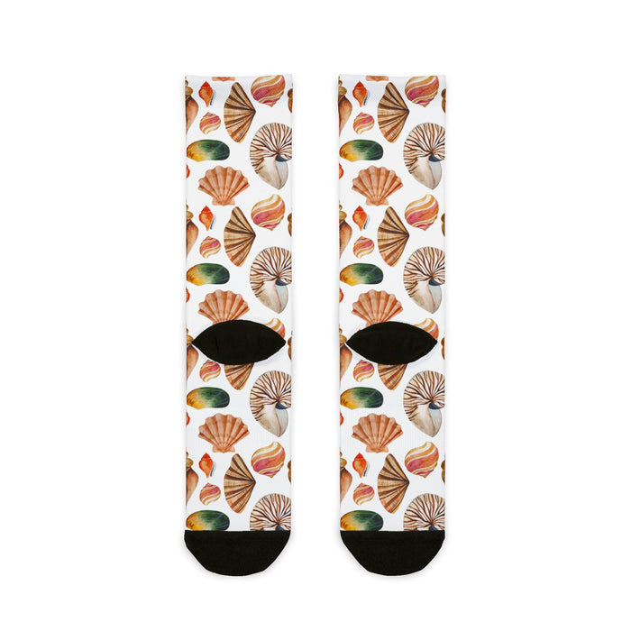 Pair of socks with shell pattern on a white background
