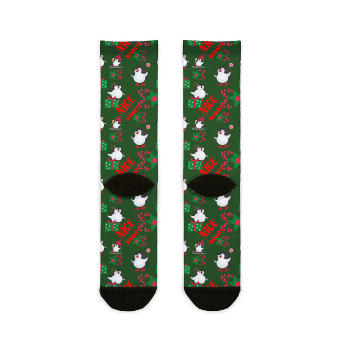 Green socks with festive design on a white background