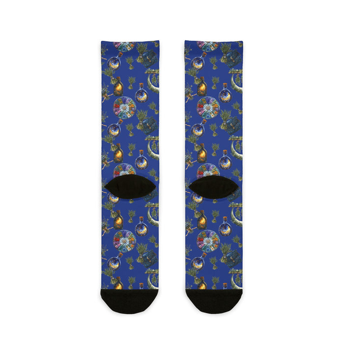 Pair of socks with a colorful pattern on a blue background