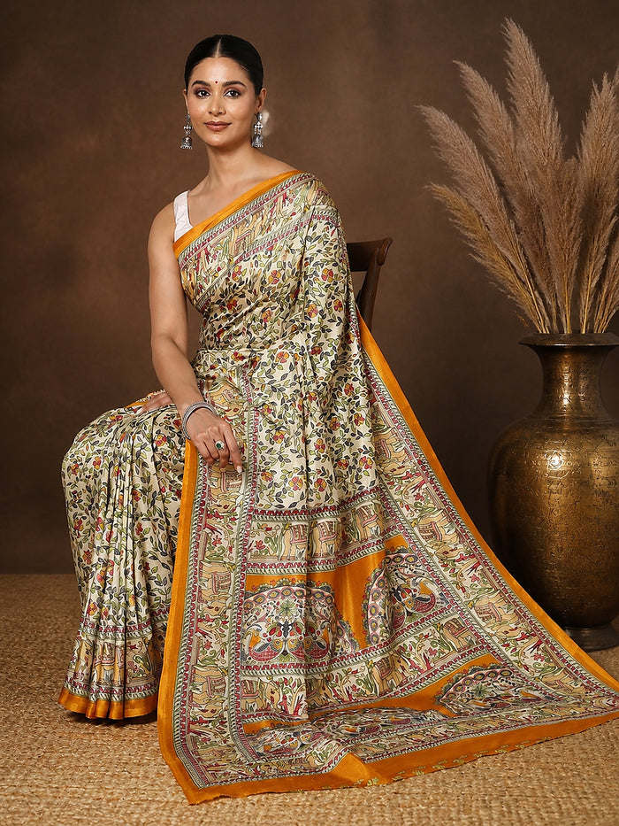 Off White printed Kashmiri silk saree with small Madhubani-style florals, a large mustard-yellow pallu panel of elephants and peacocks, and a wide contrast mustard border.