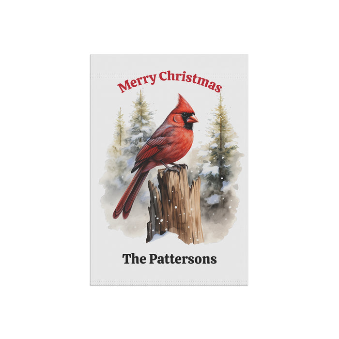 Christmas card with a red cardinal on a snowy stump and personalized text.