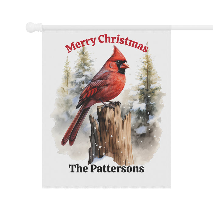 Christmas-themed decorative flag with a red cardinal, snowy trees, and 'Merry Christmas The Pattersons' text.