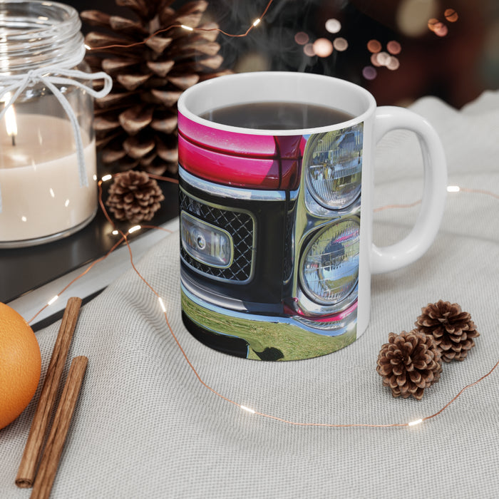 Pontiac GTO muscle car hot rod coffee mug on table with Christmas decorations.