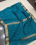 Rama green teal Maheshwari silk saree with small diamond-shaped meena buti and a wide gold zari border, handwoven in Maheshwar