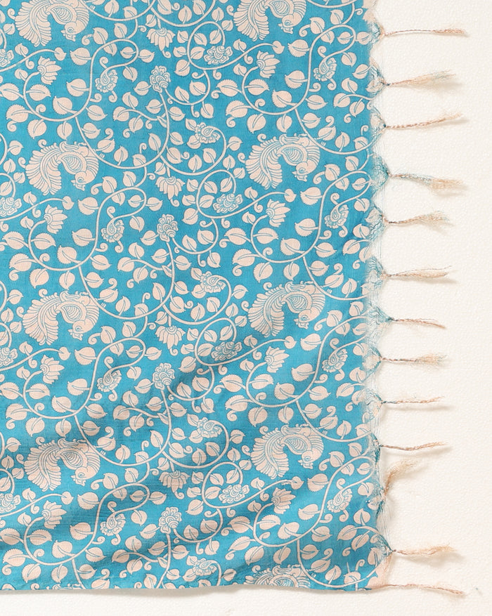 Royal blue Katan silk unstitched suit set with medium-scale cream floral and paisley block print, light pink detail inside the blooms and a tasselled dupatta edge