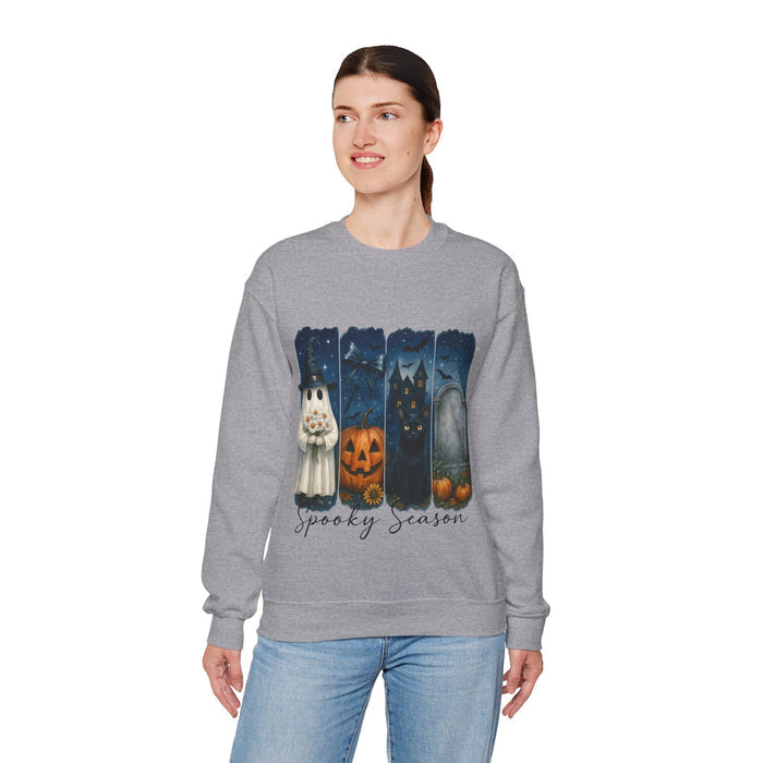 Woman wearing a gray sweatshirt with Halloween-themed design on a white background