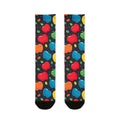 Colorful socks with apple pattern on a black background
