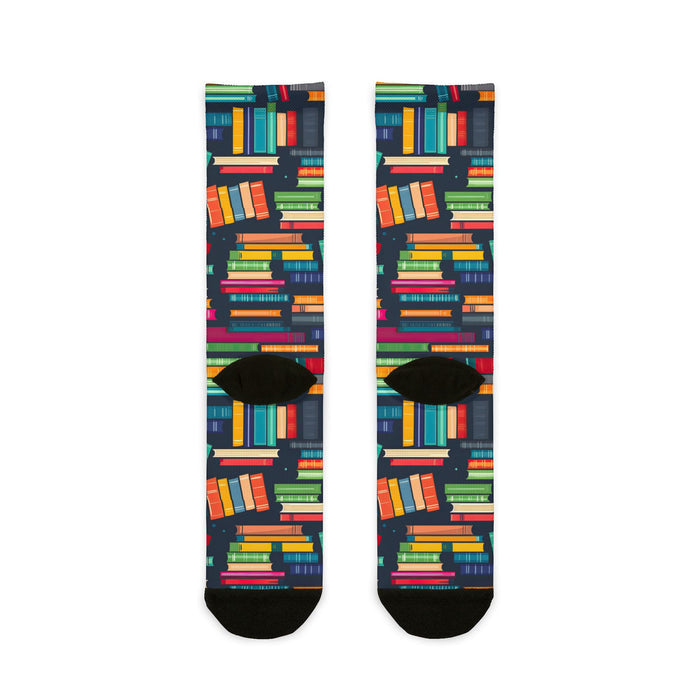 Colorful book-patterned socks on a white background