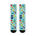 Colorful socks with school-themed design on a light blue background
