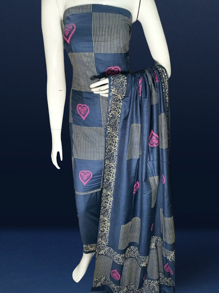 Deep teal blue and pale grey Katan silk suit set hand block printed in a grid of solid leaf motifs and striped rectangular panels with pink detailing.