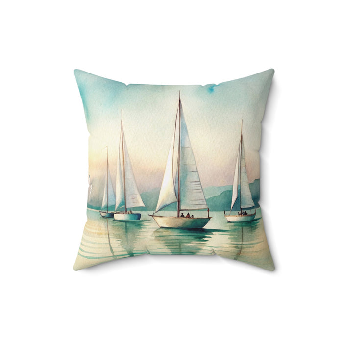 Decorative pillow with sailboat design on a white background