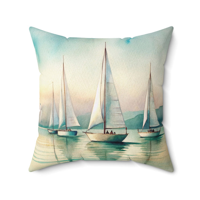 Decorative pillow with sailboat design on a white background