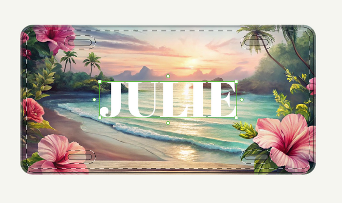 Personalized license plate with a tropical beach design and the name 'JULIE'.
