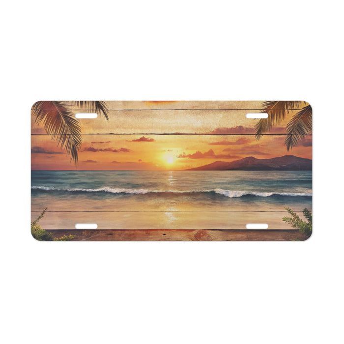 License plate with a sunset over the ocean design featuring palm trees.