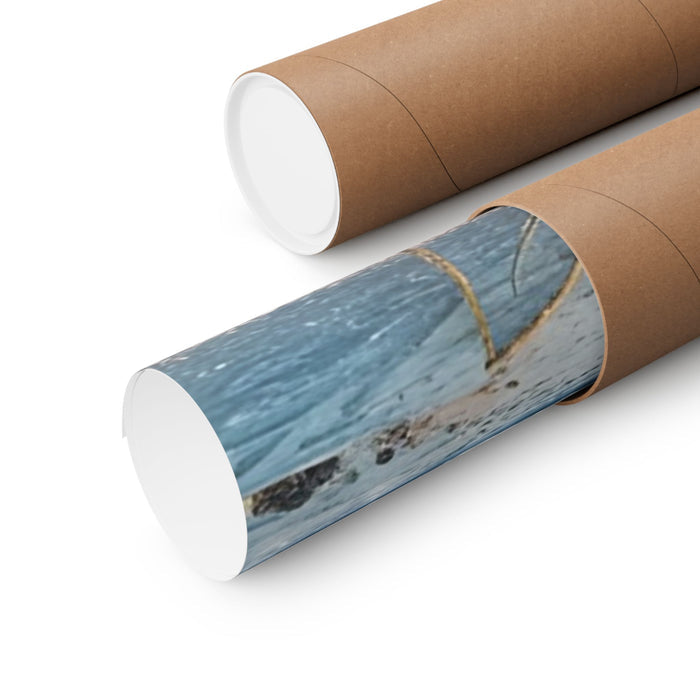 Two cardboard tubes with a beach scene design on a white background