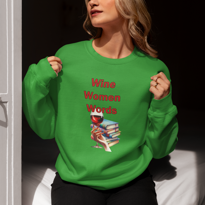 A person wearing a green sweatshirt with the text 'WINE WOMEN WORDS' printed on the front.