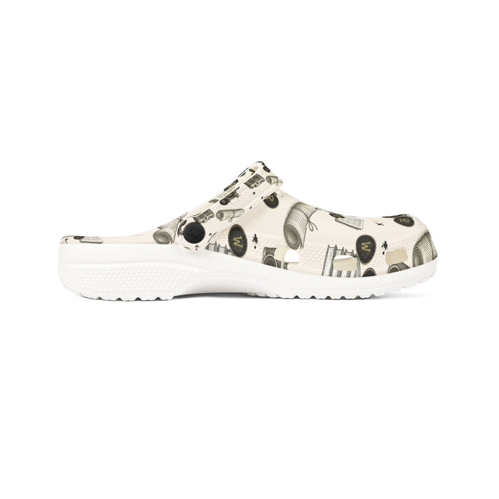 White sandal with black pattern on a white background